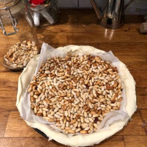 Pre-cook pastry by weighing down the pastry with baking paper then uncooked beans. This beans won't burn and you can reuse them again!